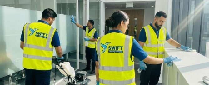 Swift Cleaning Services Cleaners team member deep cleaning a rental kitchen countertop during a professional bond clean in Adelaide